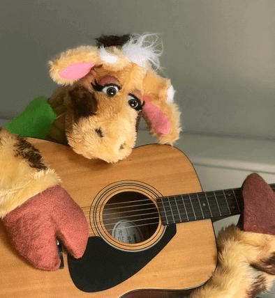 Harold practising guitar