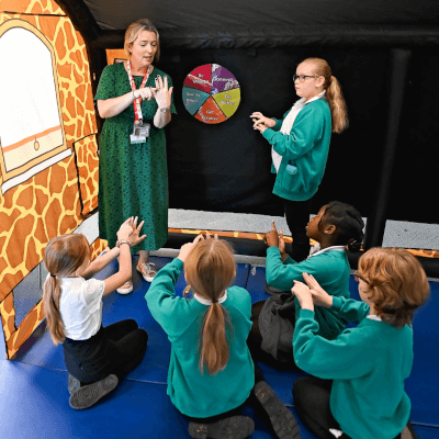 Pupils inside LifeSpace with educator